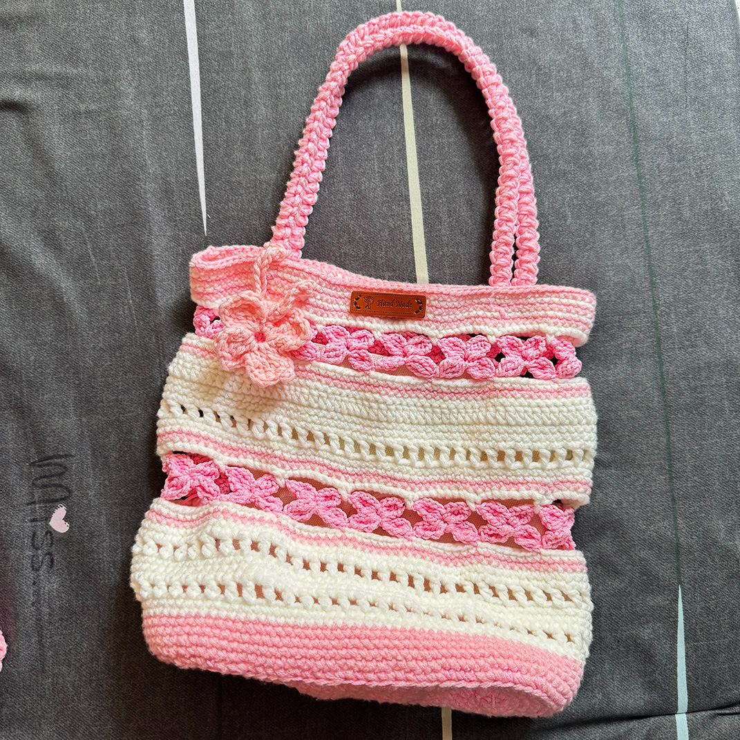 Pink and cream Strawbeshake crochet tote